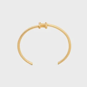 Celine Women Triomphe Asymmetric Cuff in Brass with Gold Finish